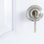 Knob locks with keys on the door